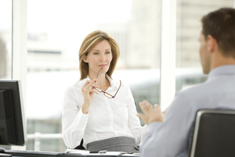 woman in interview with glasses