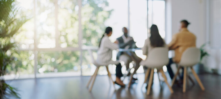 building teams in the office blurred background