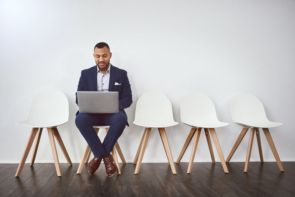 Sales Recruiters interview a sales candiate in waiting room.jpg