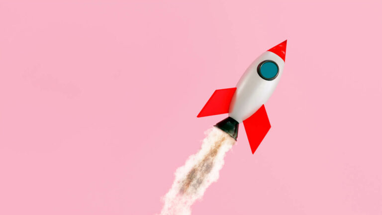rocket with pink background launching