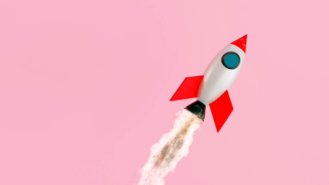 rocket with pink background launching