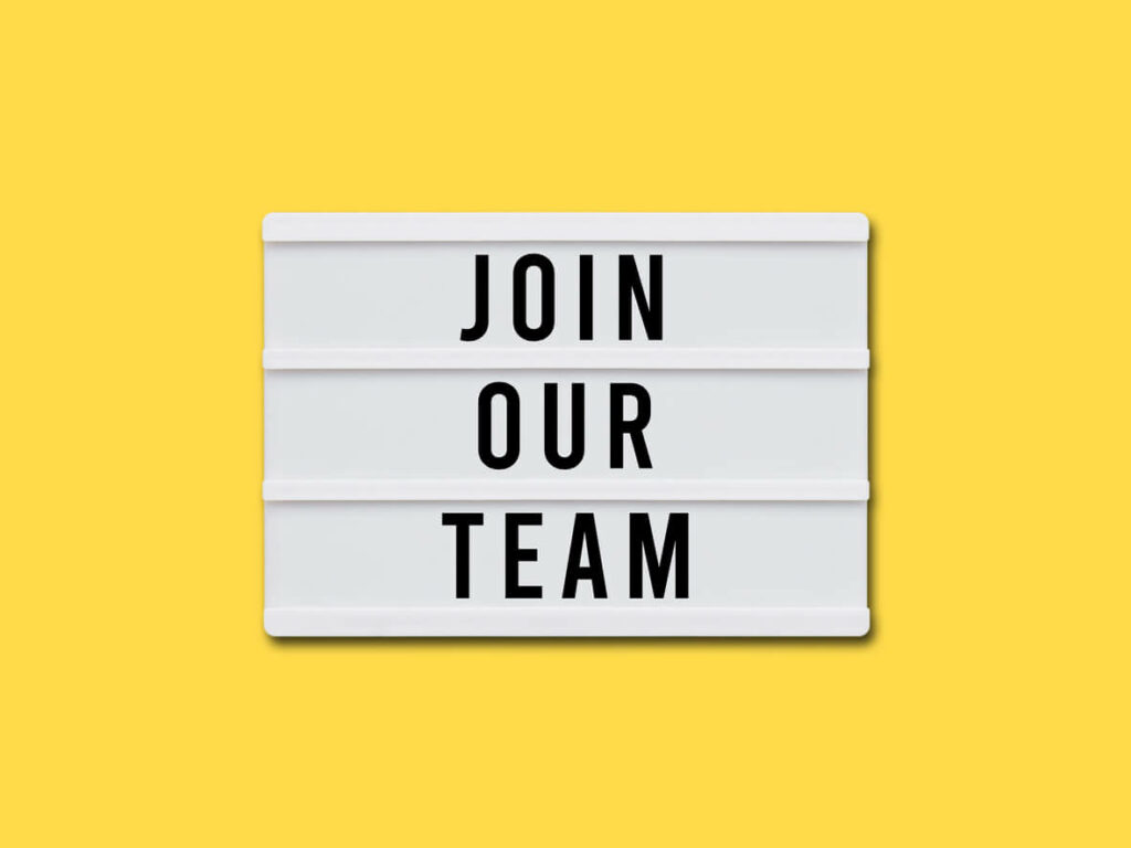 sign join our team with yellow background