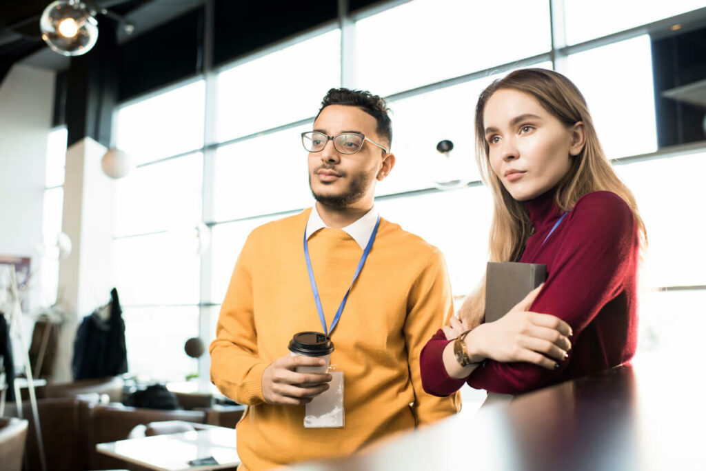 two marketing team members at a tech conference