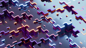 Puzzle pieces coming together representing the right fit in sales hiring