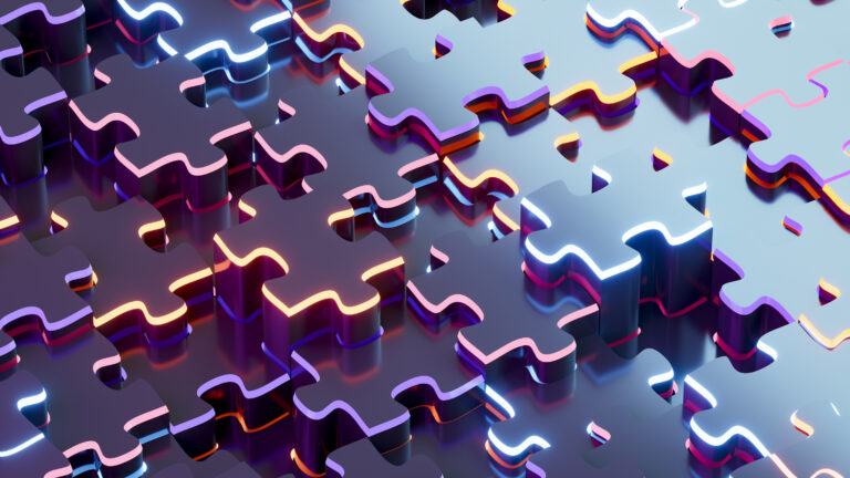 Puzzle pieces coming together representing the right fit in sales hiring