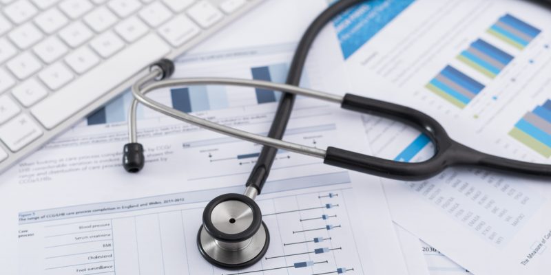 stethascope over data diagnosing problem at root cause